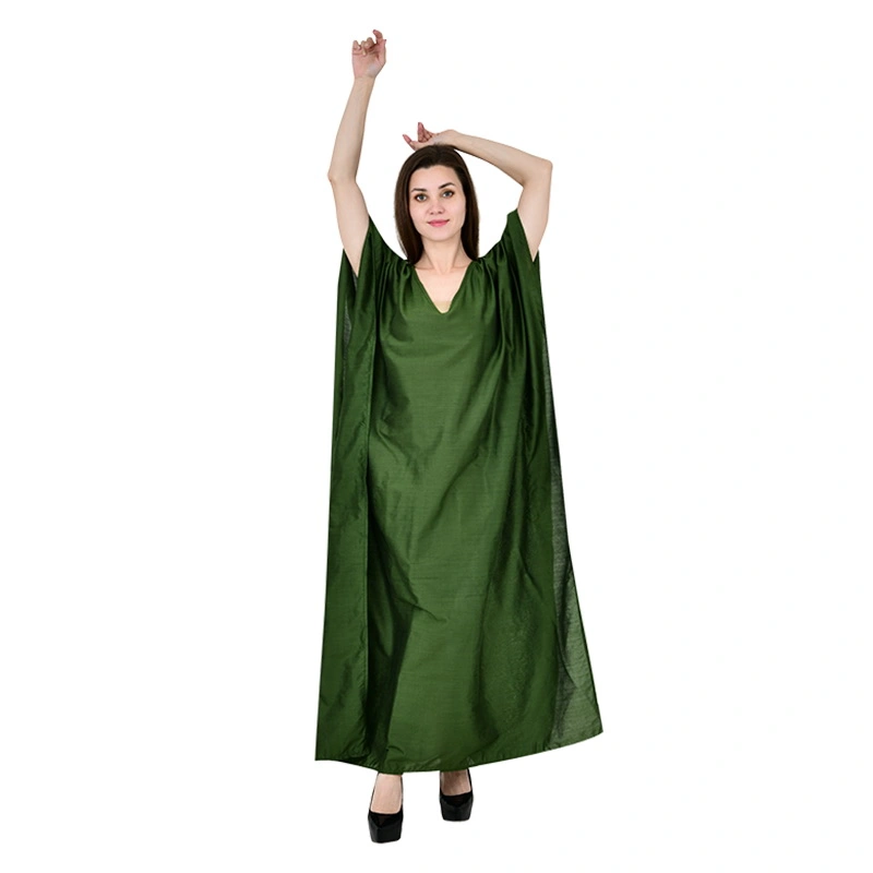 Female model in olive green flowy kaftan dress with batwing sleeves - fashion ecommerce photography by Lohar Studio Delhi
